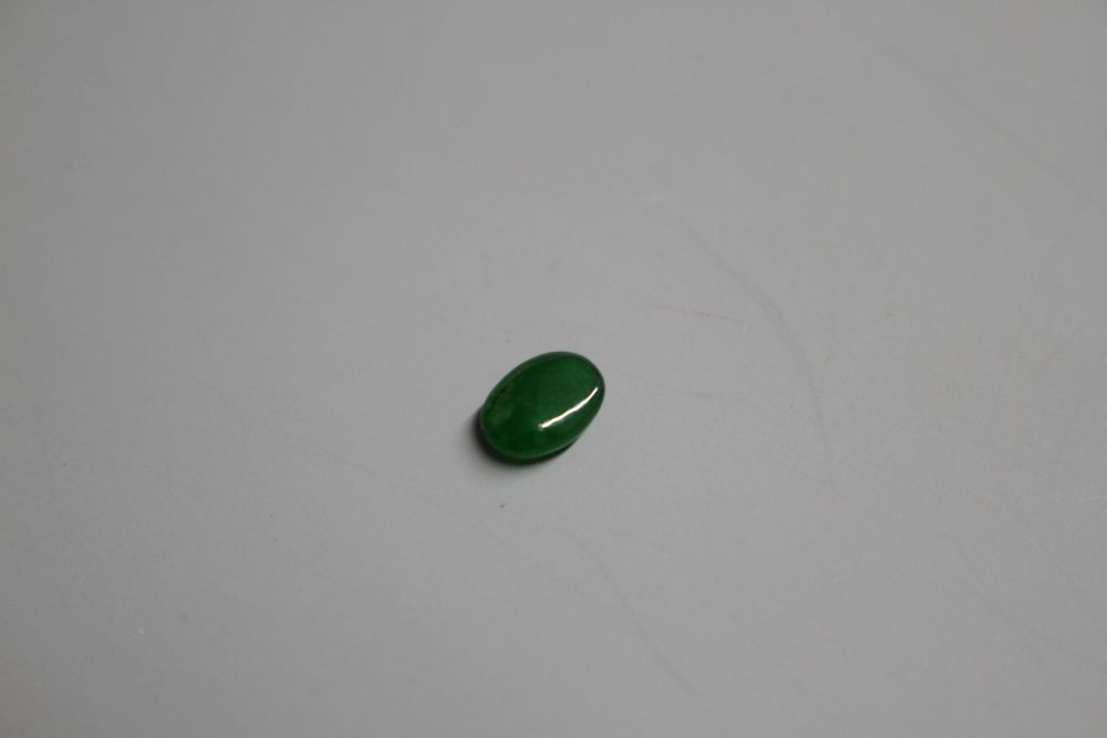 An unmounted cabochon cut jadeite stone, with GCS certificate dated 25/02/20